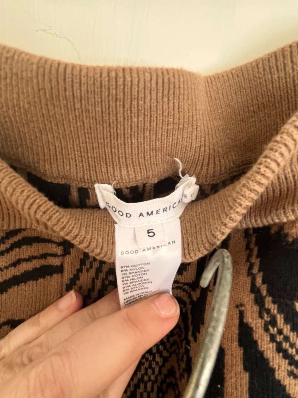 Good American Brown and Black Patterned Knit Sweater and boot cut pant set